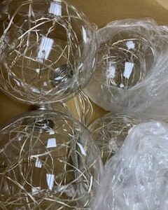 SEASONAL ABODE CLEAR BALL ORNAMENTS WITH LIGHTS (STRAND OF 9) 6”W x 7.5” H